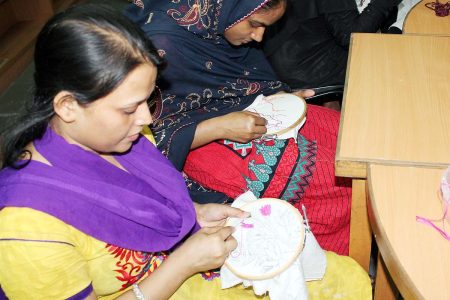 Women make embroidery work